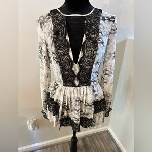 bebe Semi Sheer Animal Print Tunic in XXS.